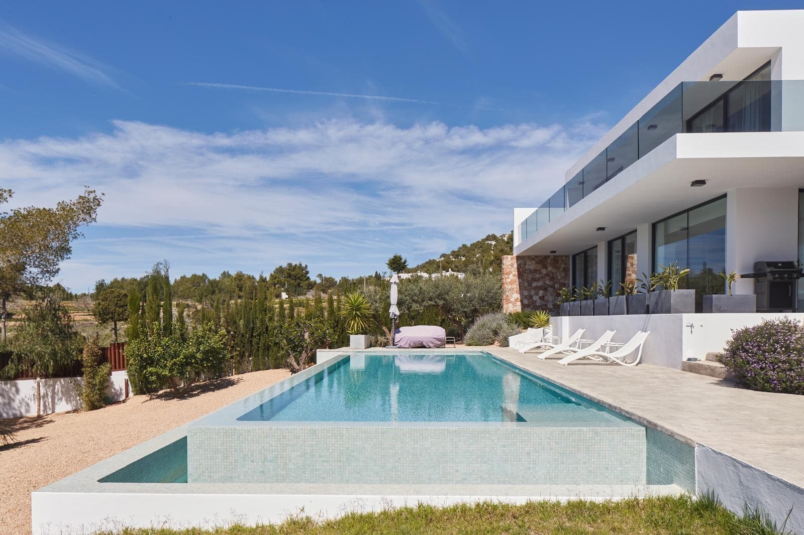 Villa Lucero and its pool set above the valley, Cala Salada, Ibiza
